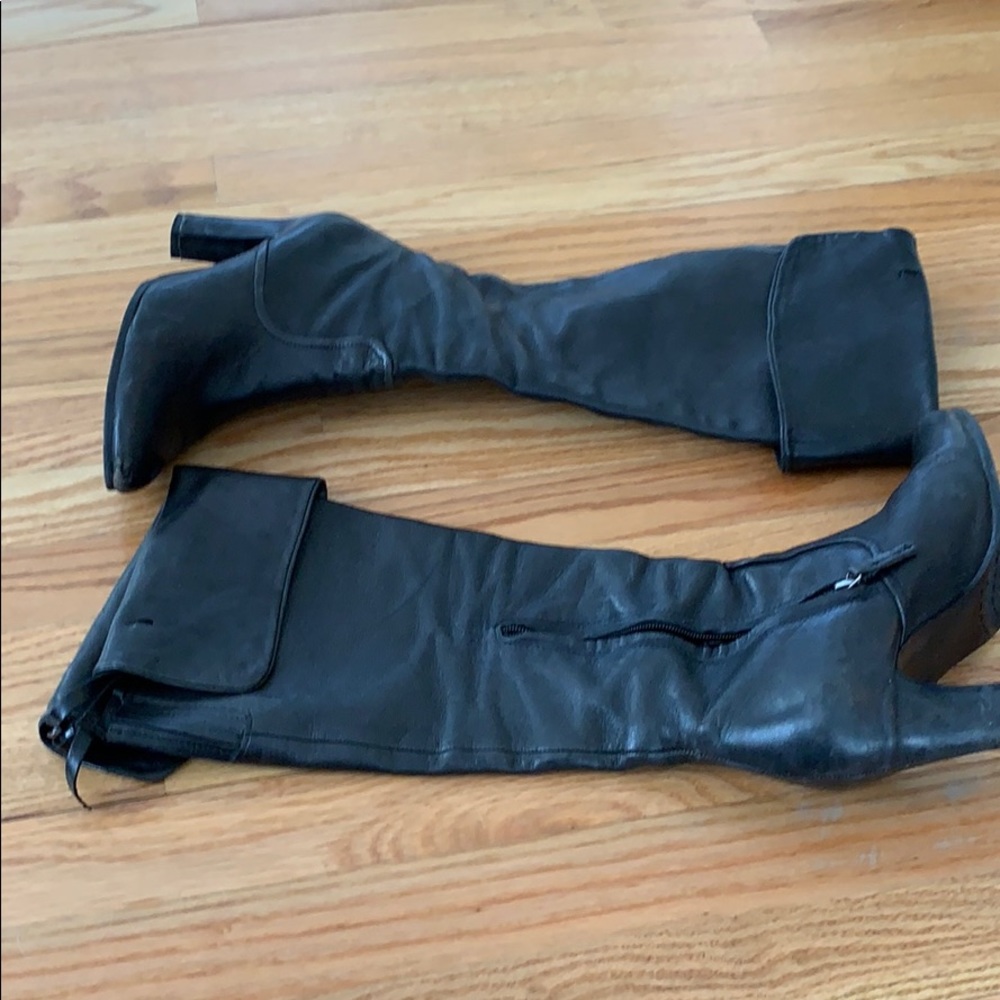 Tall black leather boots